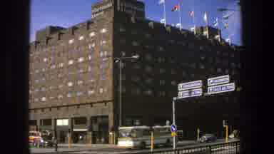 Stockholm Sweden (1975): Very Large Building With Flags Flying At The Top On A