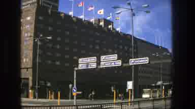 Stockholm Sweden (1975): Signposts People And Cars On The Street And Large