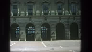 Stockholm Sweden (1975): View Of Tan Building And Empty Parking Lot On A Sunny Day