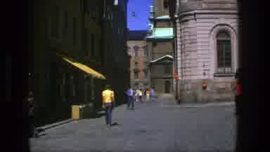 Stockholm Sweden (1975): Eight White People Living In S Europe Walking In An Alley