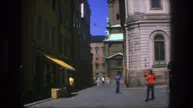 Stockholm Sweden (1975): People Walking Around The City With Old Buildings