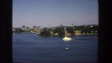 Stockholm Sweden (1975): A Boat Going Thru The Ocean Looking At The View And