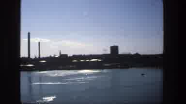 Stockholm Sweden (1975): View Of Grey Smokestack And Calm Water On A Bright Sunny