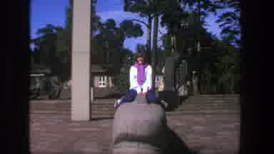 Stockholm Sweden (1975): A Person Sitting On A Statue Outside A McDonald Where