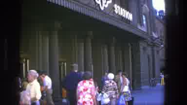 Stockholm Sweden (1975): People Are Walking In Front Of A Building In A Sunny