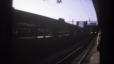 Stockholm Sweden (1975): Person Walking On The Station Platform As The Train