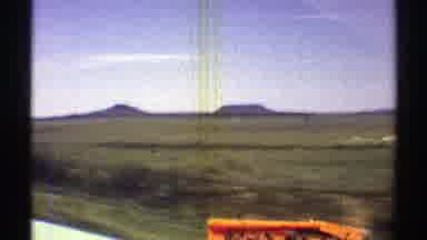Arizona (1969): People Traveling By Car On The Road On A Sunny Day