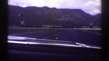 Arizona (1969): Person Driving Car On Highway With Beautiful View Of Mountains And