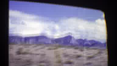 Arizona (1969): Video Starts Looking At Mountains In A Car Then Cuts To People In