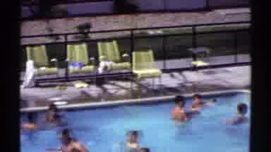 Arizona (1969): People Splashing In Crowded Pool On A Bright Sunny Day