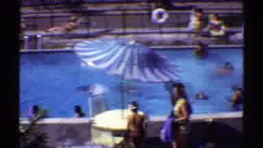 Arizona (1969): Crowded Pool In Front Of A Motel