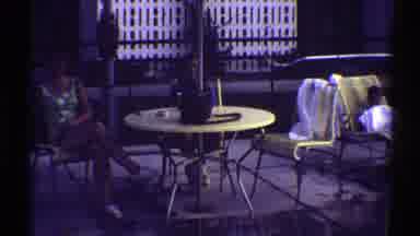 Arizona (1969): Woman Wearing Green Dress Sits At Yellow Pool Table On A Clear Day