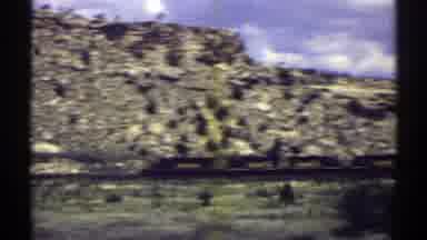 Arizona (1969): Scenery Taken From A Train Of The Countryside With A Hill Footage