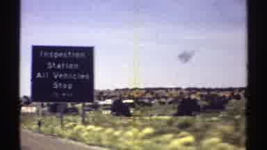 Arizona (1969): Driving On Highway With View Of Signposts And Landscapes
