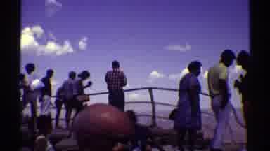 Arizona (1969): Tourists Stand Behind Guardrails On A Viewing Platform And Survey
