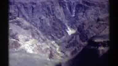Arizona (1969): Camera Panning Through A Rocky And Grey Landscape At The Mountains
