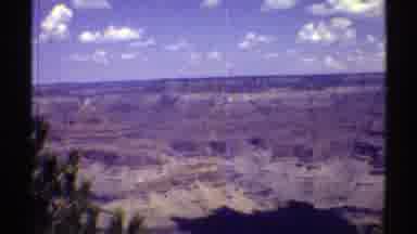ARIZONA-1969: Three Boys Looking Over A Giant Chasm Two Of The Boys Have Cameras