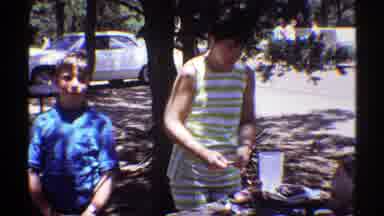 Arizona (1969): Boys And Woman At Family Picnic Waving