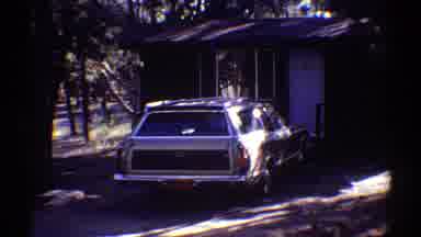 Arizona (1969): A Glides Of A Large Canyon And A Station Wagon Parked At A Cabin
