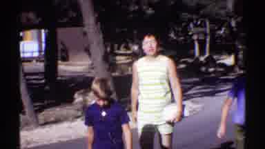 Arizona (1969): Mother With Her Two Children Walking On The Street Next To The