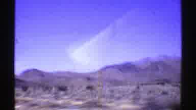 Arizona (1969): Driving Down A Road And Seeing A Desert Full Of Mountains