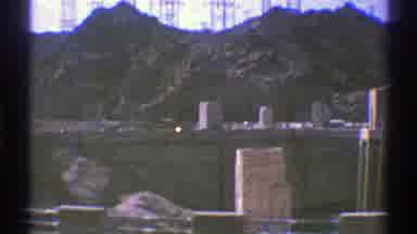Arizona (1969): Vehicle Travels On Road Above The Hoover Dam On The Colorado River