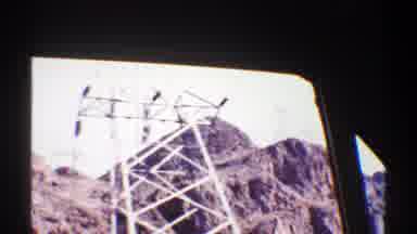Arizona (1969): View Of Grey Electrical Towers On A Bright Sunny Day