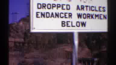 Arizona (1969): A White Sign And A Massive Dam In The Middle Of The Mountains