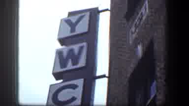 Baltimore Maryland (1961): A Notice Of A Building And An Old Woman Dressed In Gray