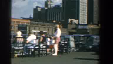 Baltimore Maryland (1961): People Sitting In The City And Women Walking With