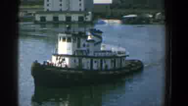 Baltimore Maryland (1961): View Of White Tugboat And Flying American Flag On A