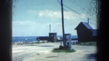 Baltimore Maryland (1961): View Of Signposts Trees And Houses With The Sea View In