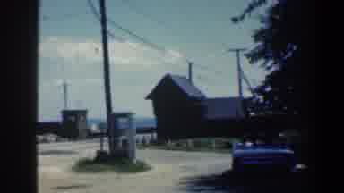 Baltimore Maryland (1961): A Convertible Car Sits Under A Shade Tree Near A Phone