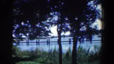 Baltimore Maryland (1961): View Of The Sea With Small Boats And Houses And Trees