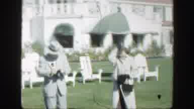Montreal Canada (1950): People Standing Near A White House And White Lawn