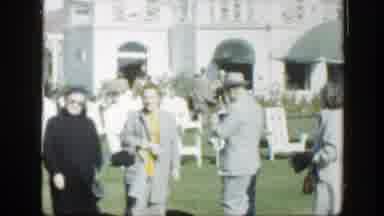 Montreal Canada (1950): People Standing On Lawn On A White House On A Bright Sunny