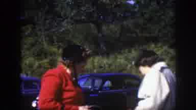 Montreal Canada (1950): Man And Woman Talk Laugh Standing Outside In Front Of