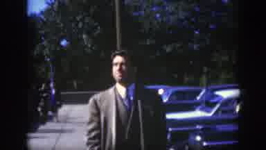 Montreal Canada (1950): Well Dressed Man Thinking In A Parking Lot