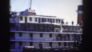 Montreal Canada (1950): People Walking In The Harbor With A Huge Ship In The