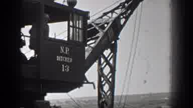 California (1936): Black And White Video Of A Crane Lifting Sand On The Beach