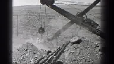 California (1936): View Of Vintage Grey Steam Powered Excavator On A Sunny Day