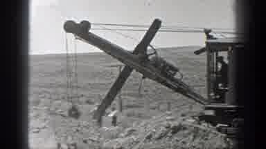 California (1936): Several People Working In The Desert On Some Train Rails Using