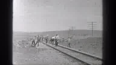 California (1936): Workers Who Work In The Railway In The Desert And Show Them The