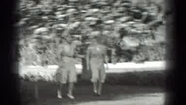 California (1936): Two Women Dressed In Dresses Enjoy An Outdoor Flower Show