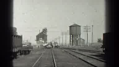California (1936): Men Getting Dropped Off Of A Train And Walking Across The Track