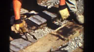 California (1936): A Group Of Workers Performing Tasks On The Train Track