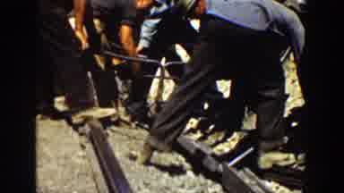 California (1936): Team Of Men Working On The Railroad Taking Apart Railroad