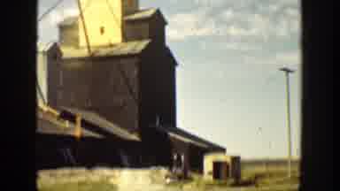 California (1936): A Large Black And Yellow House With A Church-Like Structure