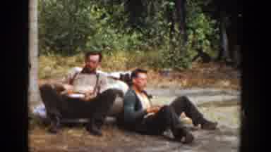 California (1936): Workers Taking A Break While Chatting And Eating Quietly While
