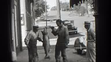 California (1936): Men Talking And Showing A Fish